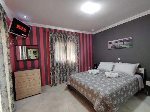 Posteľ alebo postele v izbe v ubytovaní Silver Pearl Apartment