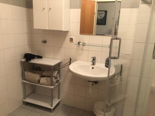 Kúpeľňa v ubytovaní MF City Apartment