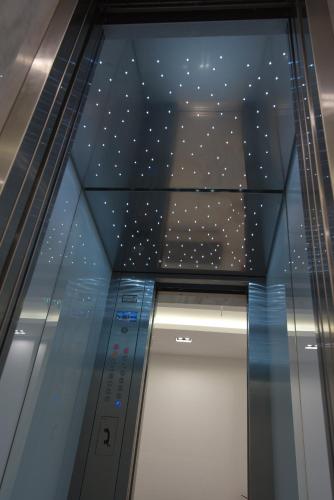 an elevator with a ceiling with stars on it at International Atene hotel in Athens