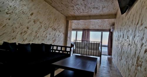 Et opholdsområde på Lazy Lounge Apartments