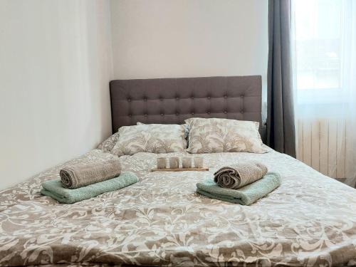Postel nebo postele na pokoji v ubytování GM Apartment, free private parking