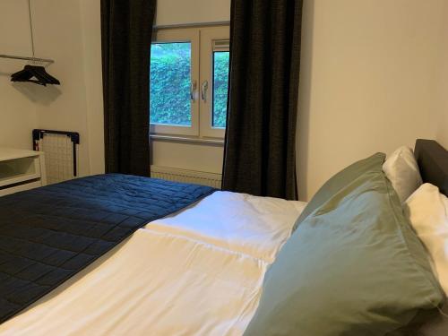 Llit o llits en una habitació de Bed en Natuurhuisje