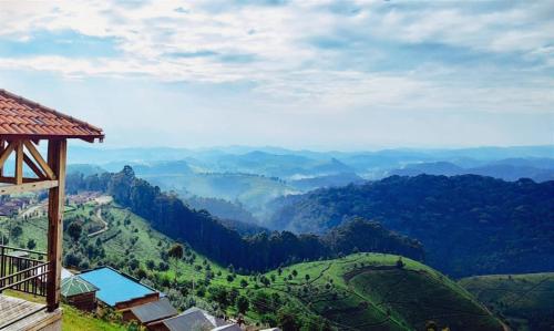 a view of a valley with mountains and trees at Kitabi EcoCenter in Gabegi