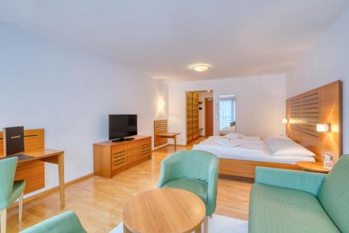 Postel nebo postele na pokoji v ubytování Hotel Cevedale