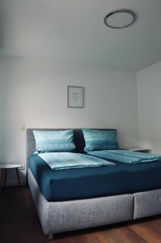 Casa Amalie Neustadt tesisinde bir odada yatak veya yataklar