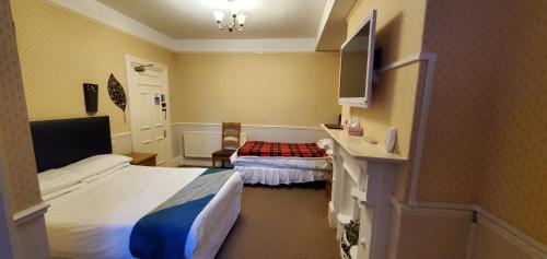 Ένα ή περισσότερα κρεβάτια σε δωμάτιο στο Diamonds Guest House