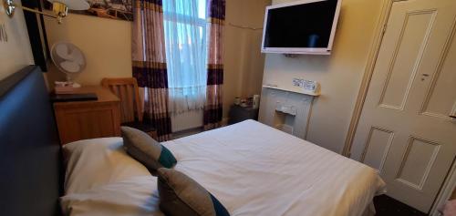 Ένα ή περισσότερα κρεβάτια σε δωμάτιο στο Diamonds Guest House