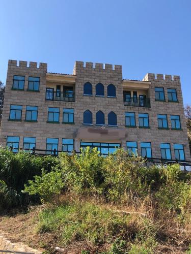 an office building on top of a hill at Lohas Seaview B&B in Beigan