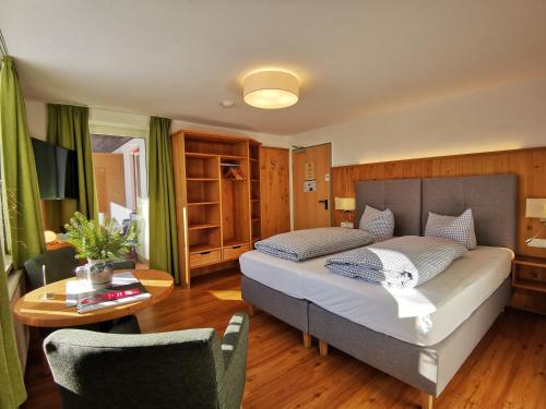 Postel nebo postele na pokoji v ubytování Hotel Waldmann