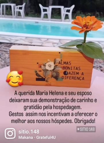 a sign for a marina margarita helenaena selez approvedacion at Sitio148 Hospedaria in Penedo