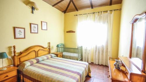 Postel nebo postele na pokoji v ubytování Torrejon Antequera - La Higuera by Ruralidays