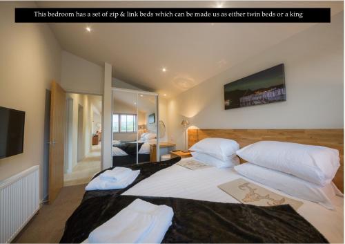 Una cama o camas en una habitación de Balloch Park