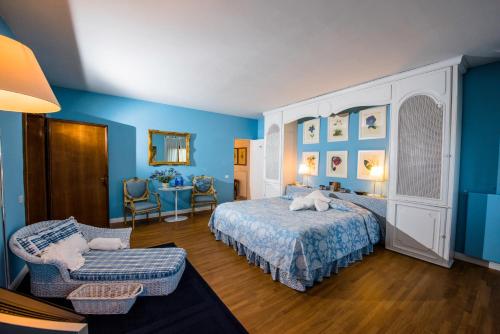 سرير أو أسرّة في غرفة في Villa Domenica Relais