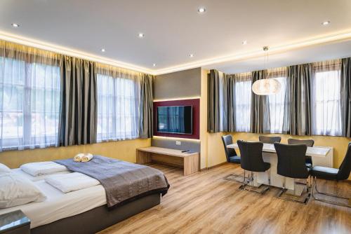 Postel nebo postele na pokoji v ubytování VillaJazz Apartments