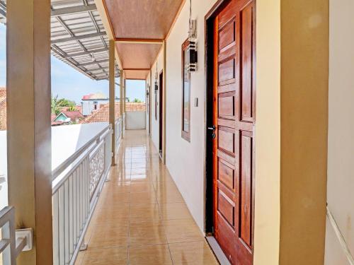 Un balcon sau o terasă la OYO 92054 Gala Residence