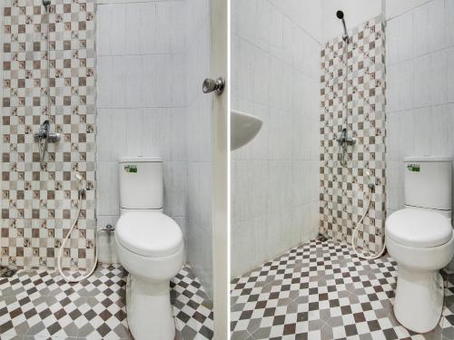 a bathroom with a toilet and a shower at OYO 92055 Nirvana Homestay Syariah in Bangkinang