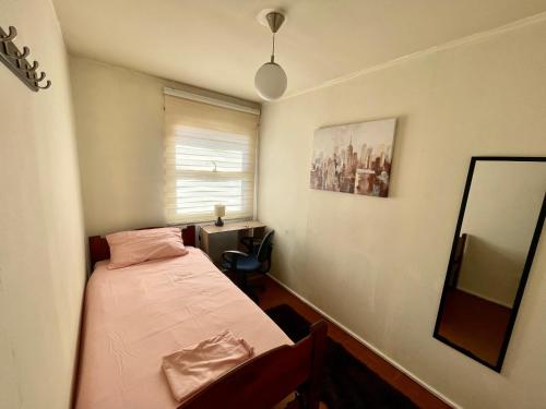 Postel nebo postele na pokoji v ubytování Amplio departamento céntrico