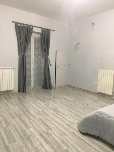 Postel nebo postele na pokoji v ubytování Casa Rosy