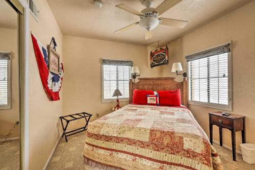 a bedroom with a bed and a ceiling fan at Williams Vacation Rental with Mountain View! in Williams
