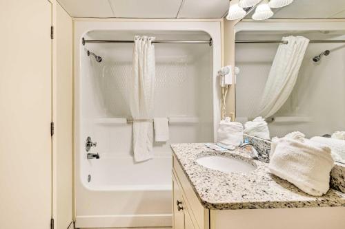 a bathroom with a sink and a shower at Oceanfront Myrtle Beach Condo with Balcony! in Myrtle Beach