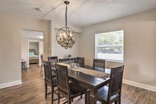 a dining room with a table and chairs at Pet-Friendly Gulfport Home Less Than 2 Mi to Beach in St Petersburg