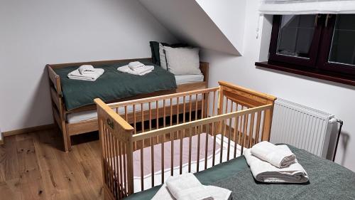 Postel nebo postele na pokoji v ubytování Apartmán na Pasekách