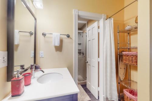 a bathroom with a sink and a shower at Bella Paradiso 11 in Eureka Springs