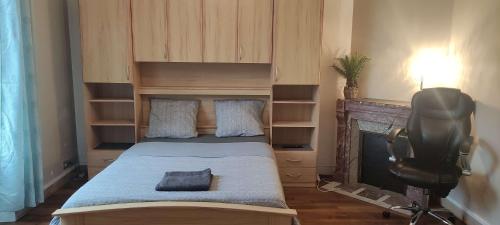 Ένα ή περισσότερα κρεβάτια σε δωμάτιο στο Chambres HABILIS