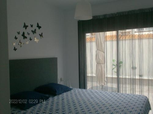 A bed or beds in a room at Senika