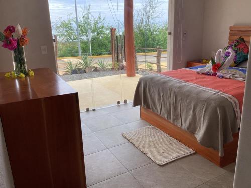 Postel nebo postele na pokoji v ubytování Casa Bajito Bay