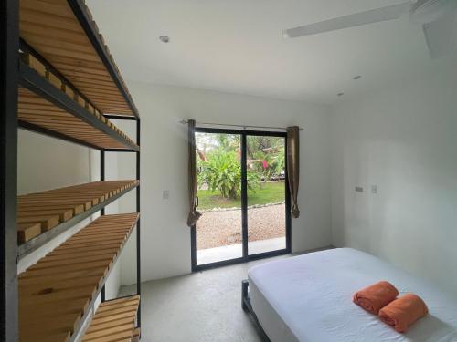 Postel nebo postele na pokoji v ubytování Pyramid Tamarindo Luxury Hotel