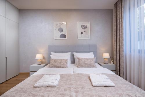 Posteľ alebo postele v izbe v ubytovaní ENA, Luxury Apartments Opatija