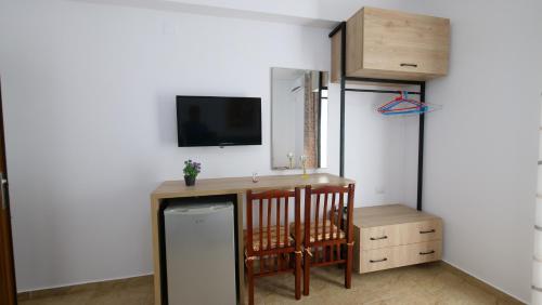 Kiri S.Apartamentsにあるテレビまたはエンターテインメントセンター