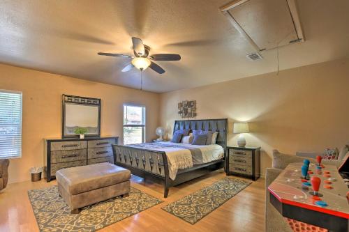 a bedroom with a bed and a ceiling fan at San Antonio Oasis with Hot Tub, Pool and Outdoor Bar! in San Antonio