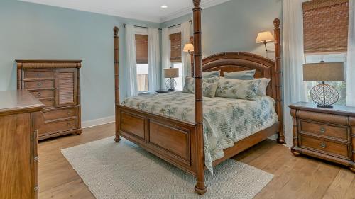 En eller flere senge i et værelse på Blue Bungalow