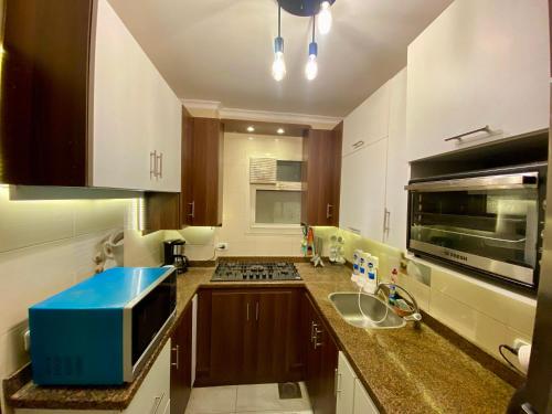 מטבח או מטבחון ב-Cozy 2BR Apartment in Maadi