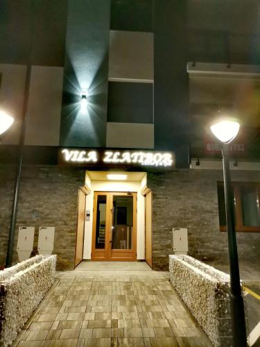 a view of the entrance to a wisconsin laboratories building at Belvedere Zlatibor LUX & SPA Apartment in Zlatibor