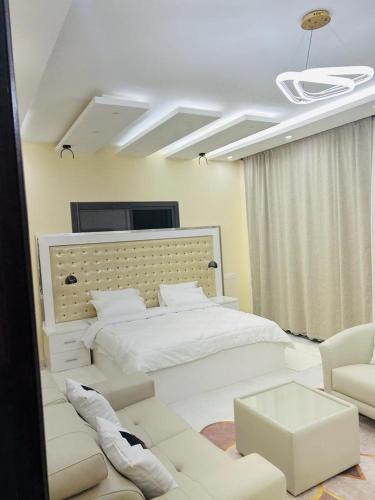 VILLA NAYFAL tesisinde bir odada yatak veya yataklar