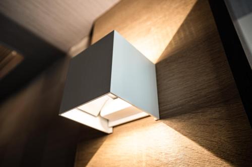 a light on the floor in a room at Global Traveler Hotel in Kaohsiung