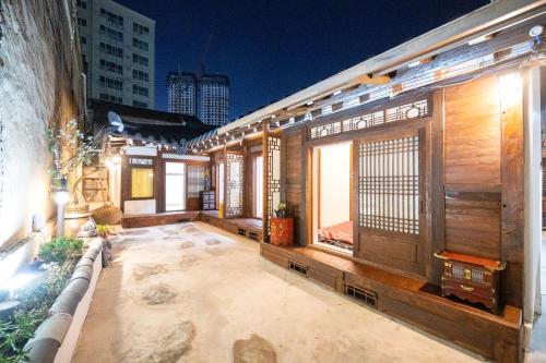 an outside view of a building with a patio at Hanok1942 in Daegu