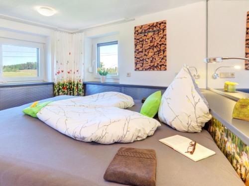 a bedroom with two beds and a sink at Grub-Daniel-Hof in Freiamt