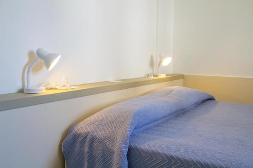 Una cama o camas en una habitación de Residence Playa