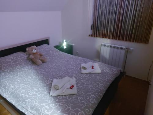 Krevet ili kreveti u jedinici u okviru objekta Apartman Adzic