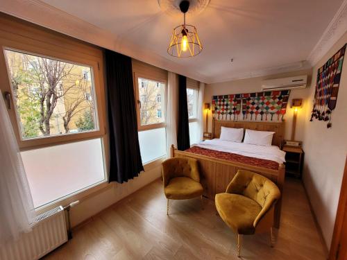 Postel nebo postele na pokoji v ubytování Masif House