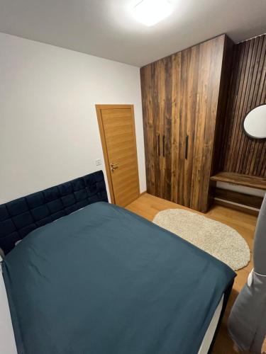 Una cama o camas en una habitación de Apartman ,,Krčmar1” Divcibare