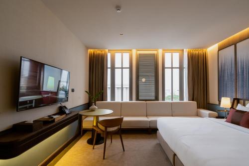 TV a/nebo společenská místnost v ubytování Hotel MOCO
