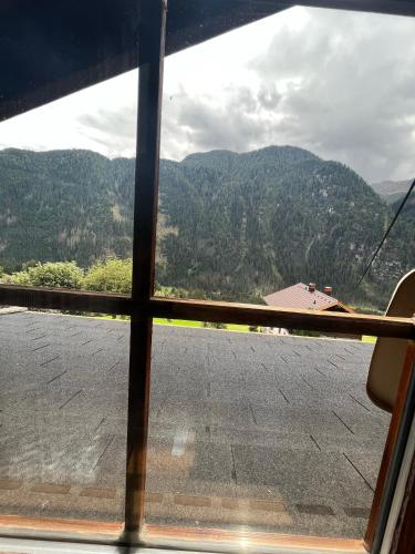 a view of a mountain from a window at Mühle in Görtschach in Sankt Veit in Defereggen