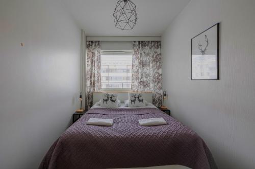 Postel nebo postele na pokoji v ubytování Arctic City Center Home