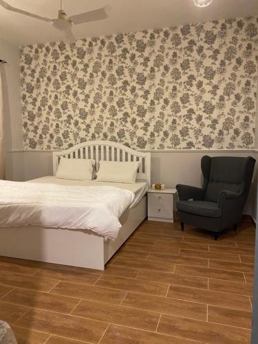Postel nebo postele na pokoji v ubytování ALULA WINTER
