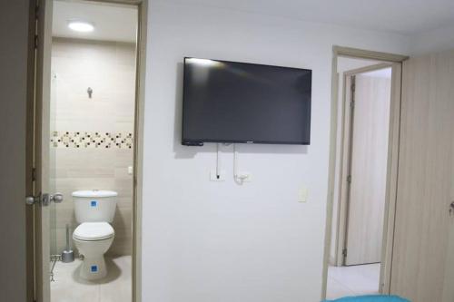 TV a/nebo společenská místnost v ubytování Encantador y Cómodo apartamento en condominio